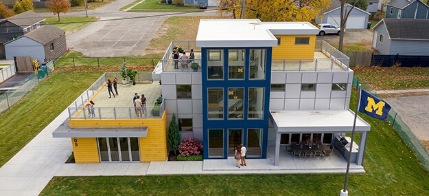 Modern multi-level home near the University of Michigan in Ann Arbor featuring rooftop decks, outdoor living space, and contemporary architecture.