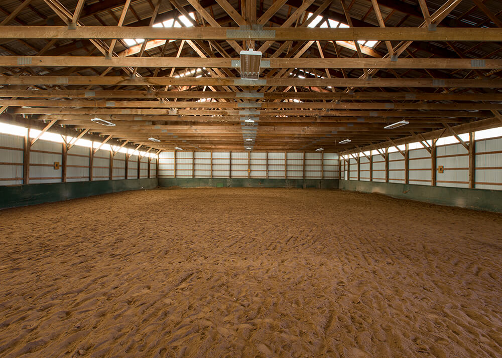 Equestrian riding arena base preparation and construction by Cutting Edge Construction in Southeast Michigan